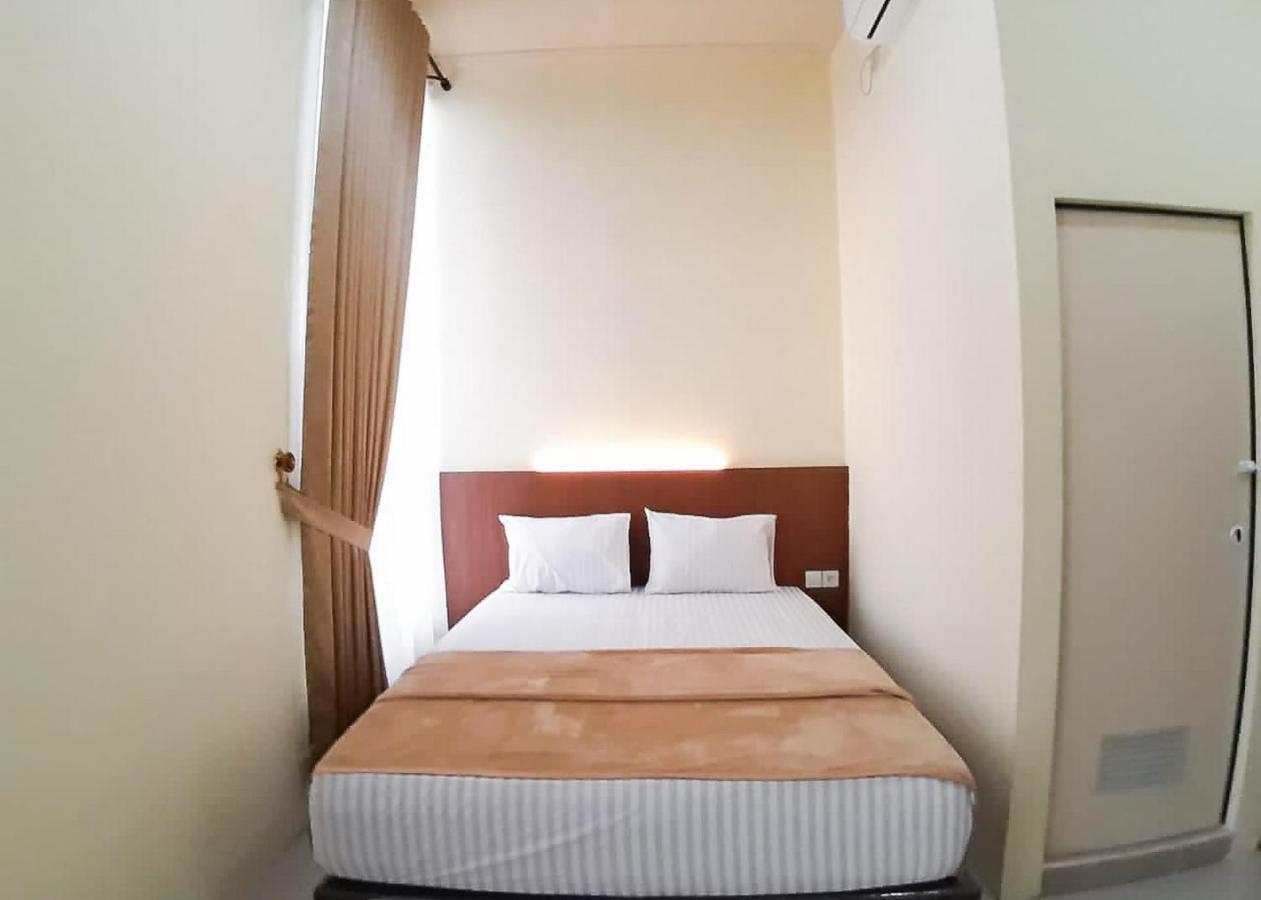 RedDoorz Syariah near Transmart Jambi 2 Hotel Paalmerah Bagian luar foto