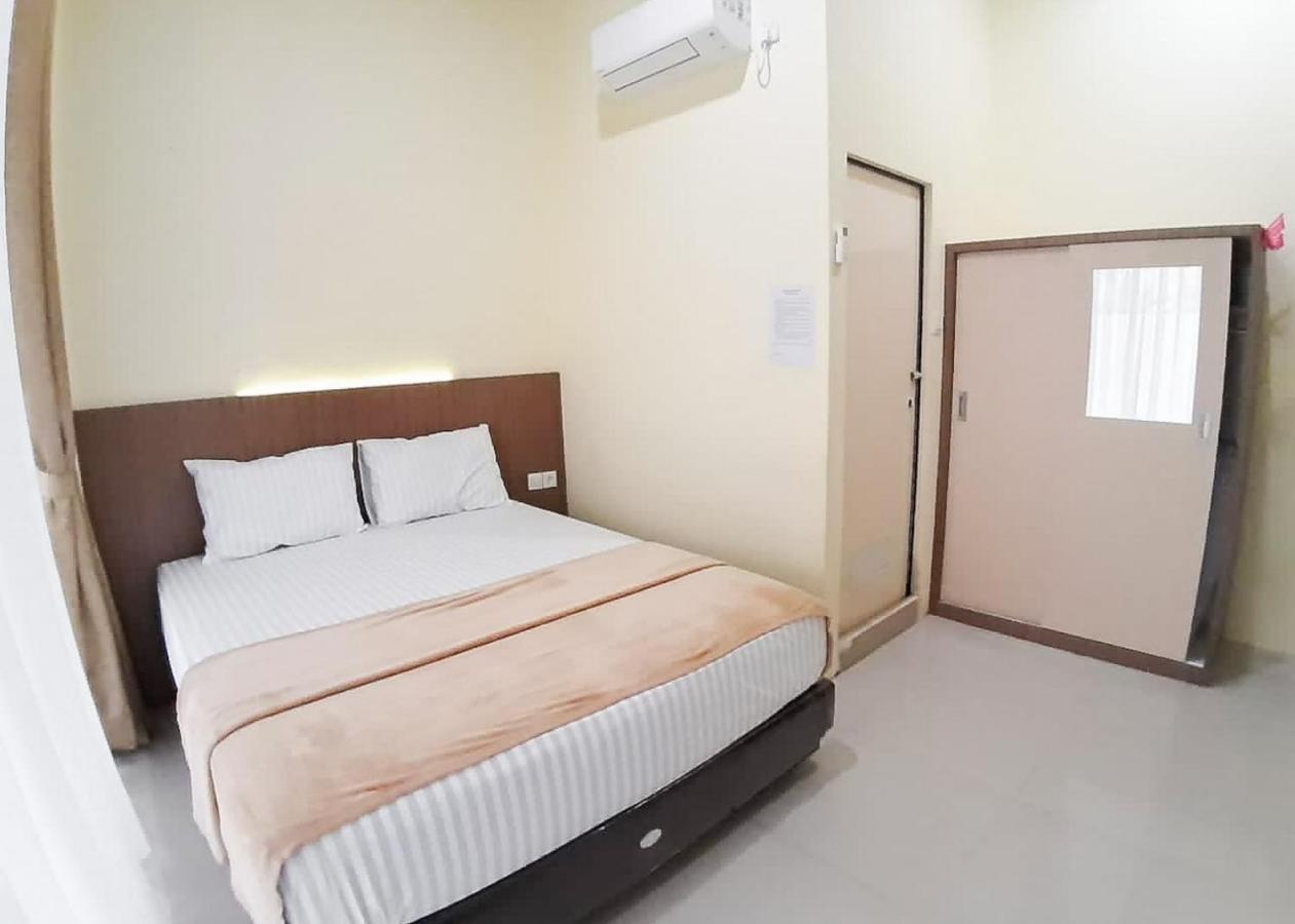 RedDoorz Syariah near Transmart Jambi 2 Hotel Paalmerah Bagian luar foto